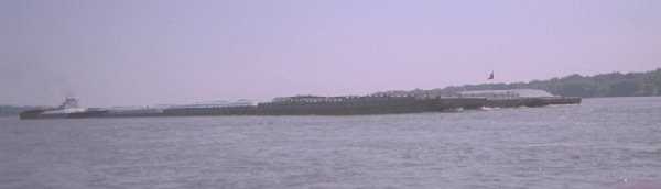 16 barges going down river